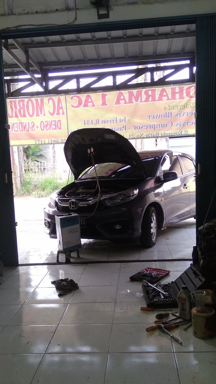 Pengerjaan AC Mobil Dharma 1 AC